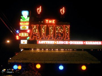 Alibi sign at night picture by Laura