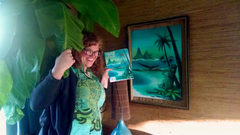 Sophista-Tiki Dawn Frasier with Tiki Magazine and her original painting