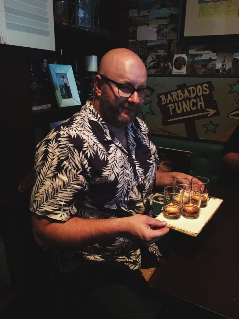 Ray with rum flight at Rumba photo by Erika