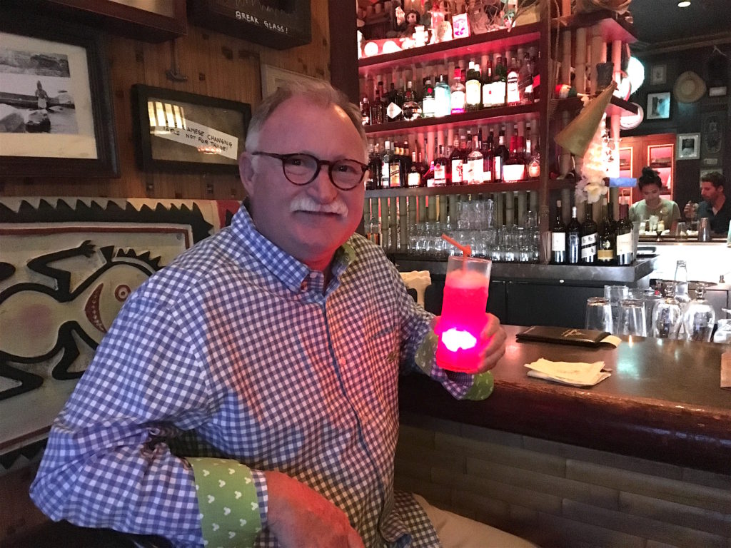 Paul's drink is lit up at Trader Sam's