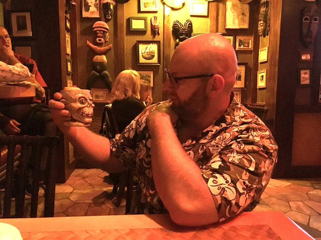 Ray pondering the Shrunken Zombie Head at Trader Sam's