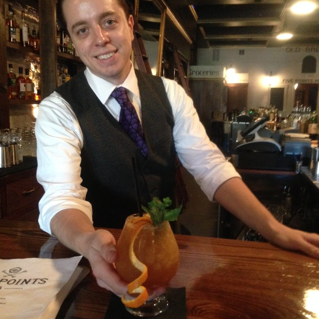 Brian Rechenmacher bartending at Five Points