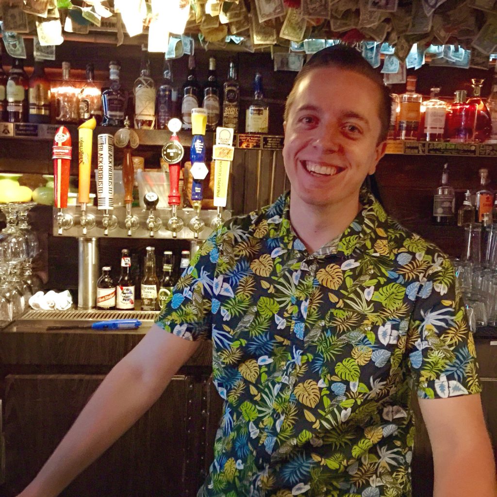 Brian Rechenmacher bartending at Forbidden Island