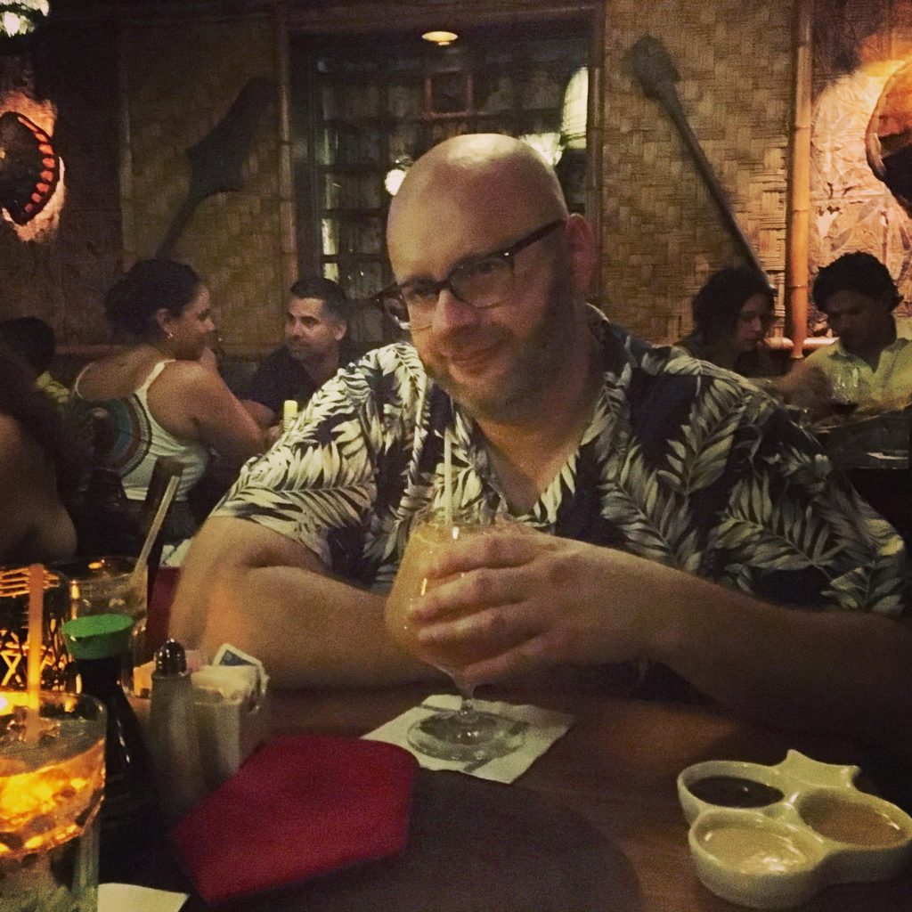 Ray drinking a Hukilau at The Mai Kai