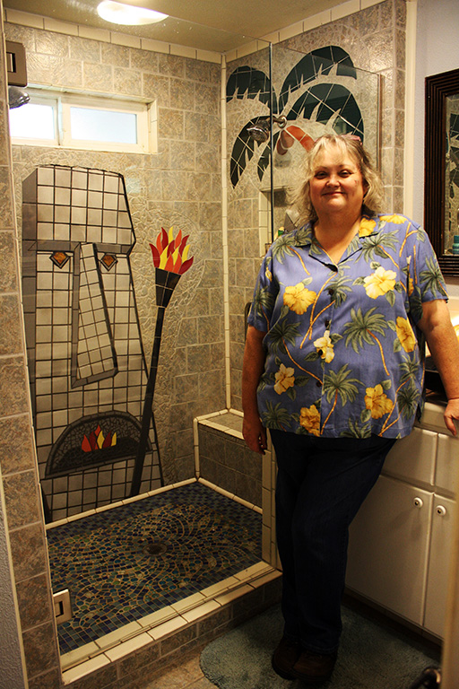 Debbie with her Moai Tile desigin she created