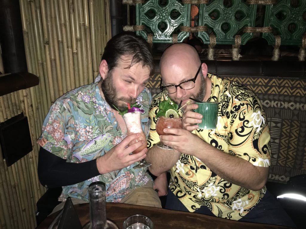 Double fisting drinks at Pagan Idol