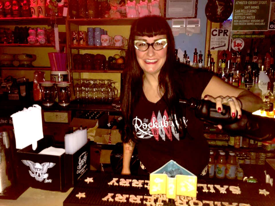 Jukebox Jodi behind the bar at Otto's Shrunken Head