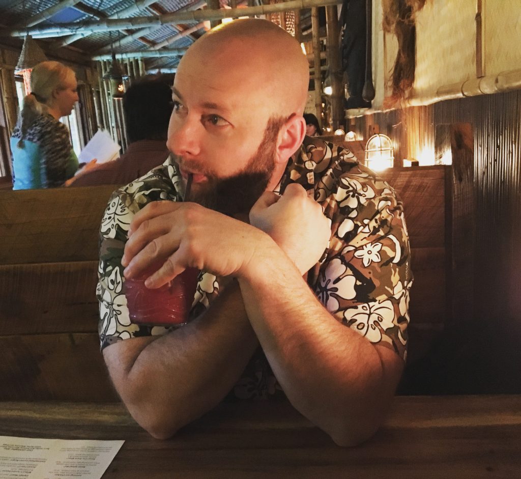 Ray drinking a Ginger Island at North Shore Lagoon