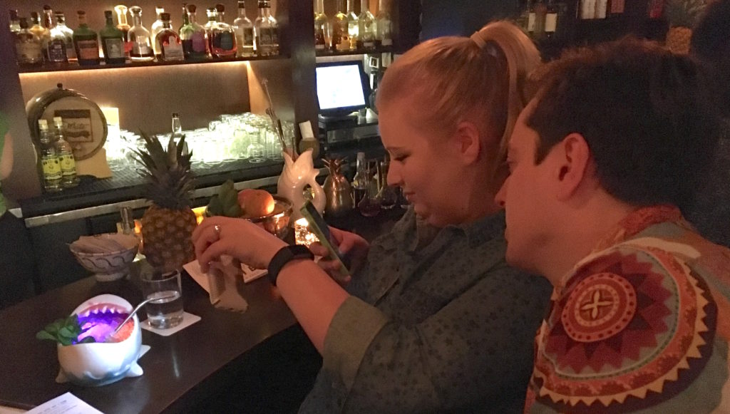 Mary and Brian taking a picture of the Shark With Laser Beams at Rumba