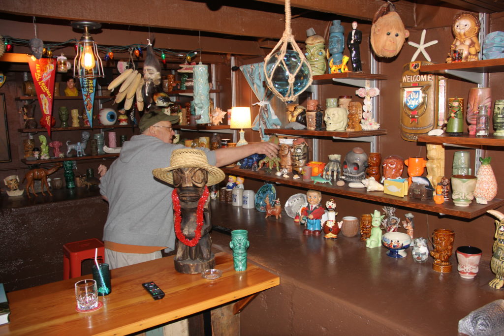 Bill Reedy and his Tiki mug collection