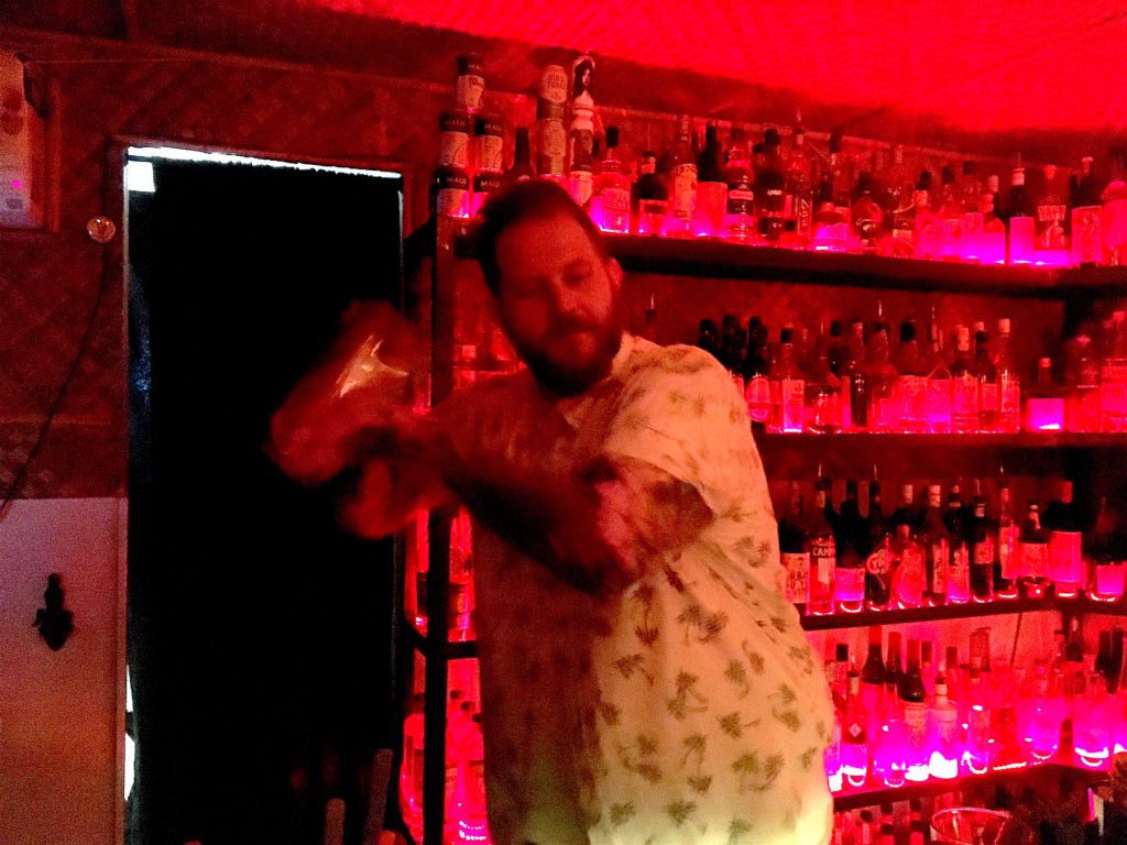 Chad Austin making drinks at Bootlegger Tiki