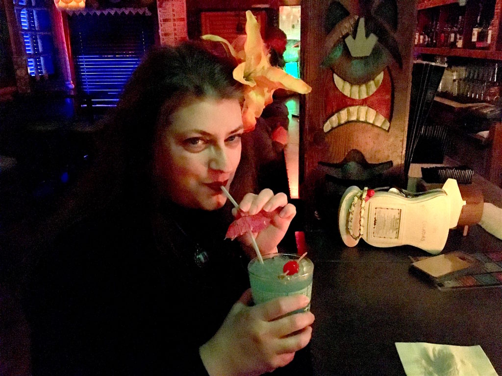 Lisa drinking a Blue Hawaiian at Foundation