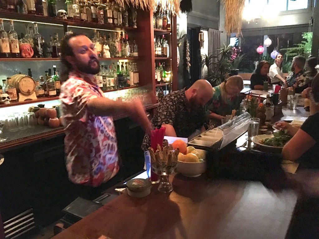 Bartenders making TIki drinks at The Burgundian